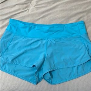 Turquoise blue lululemon speed shorts 8